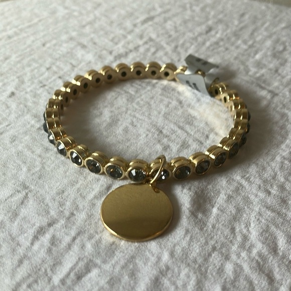 Gold tone slip on faux gem bracelet with gold charm - Picture 1 of 16